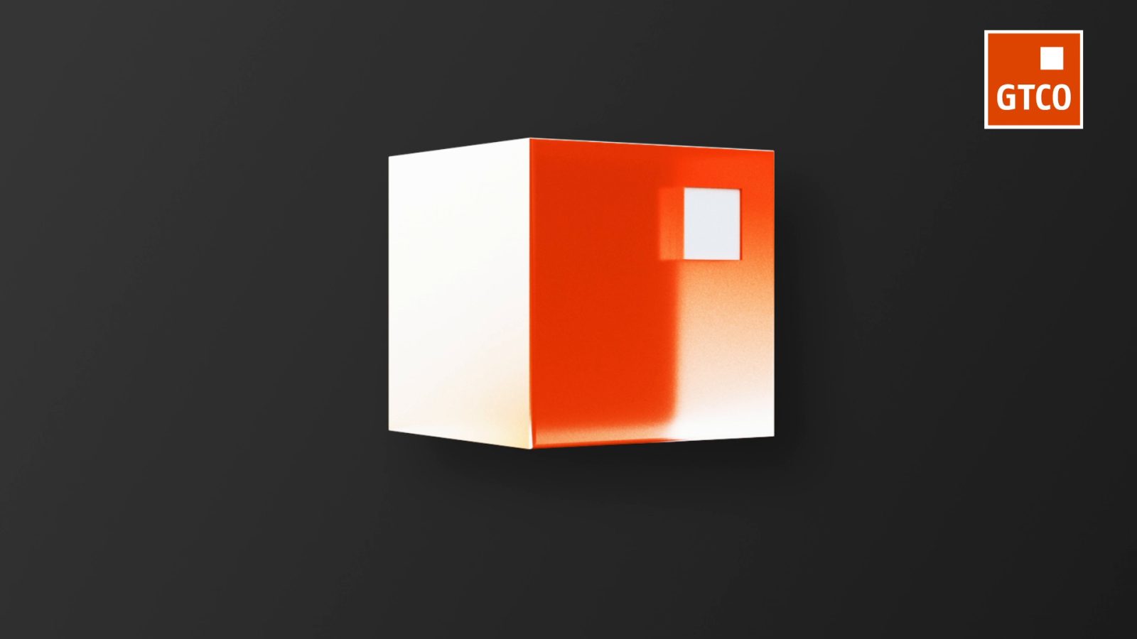 The same brand cube lit against charcoal