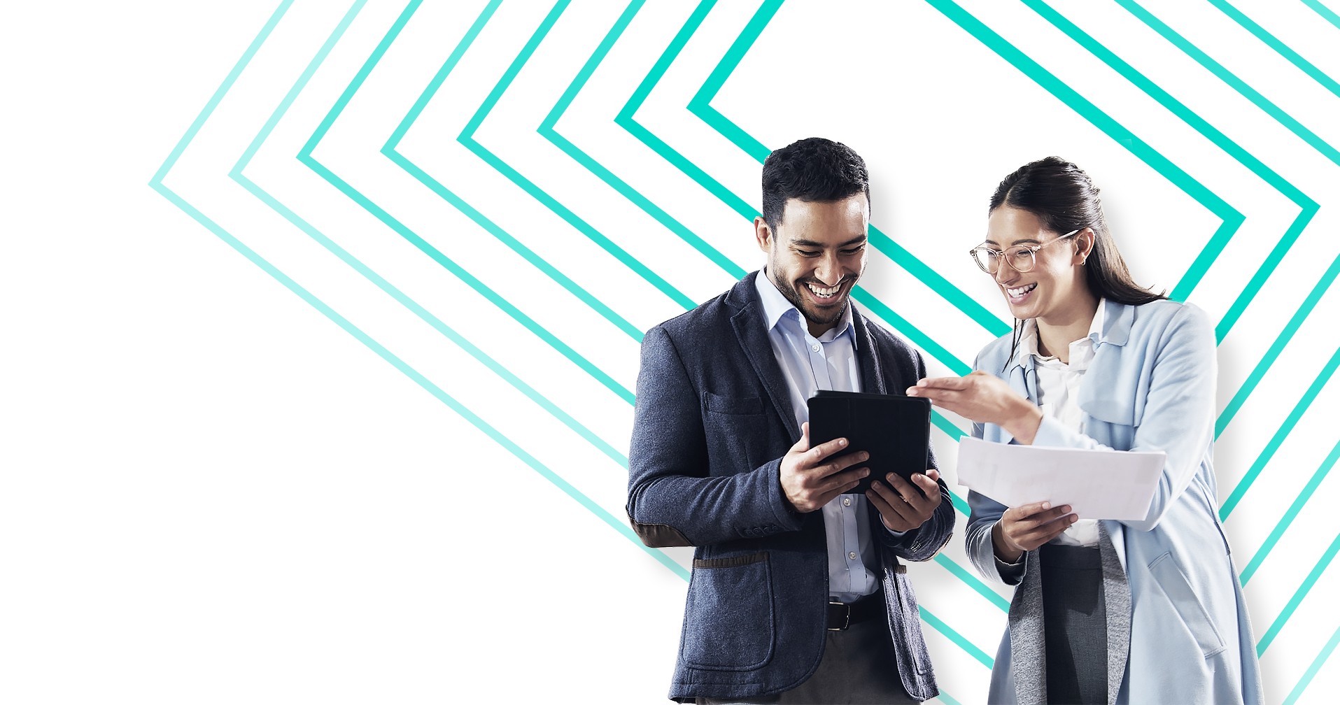 Two smiling colleagues looking at a tablet in front of teal chevron lines